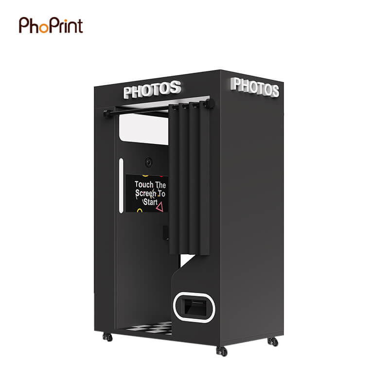 A decorated photo booth setup at a birthday celebration