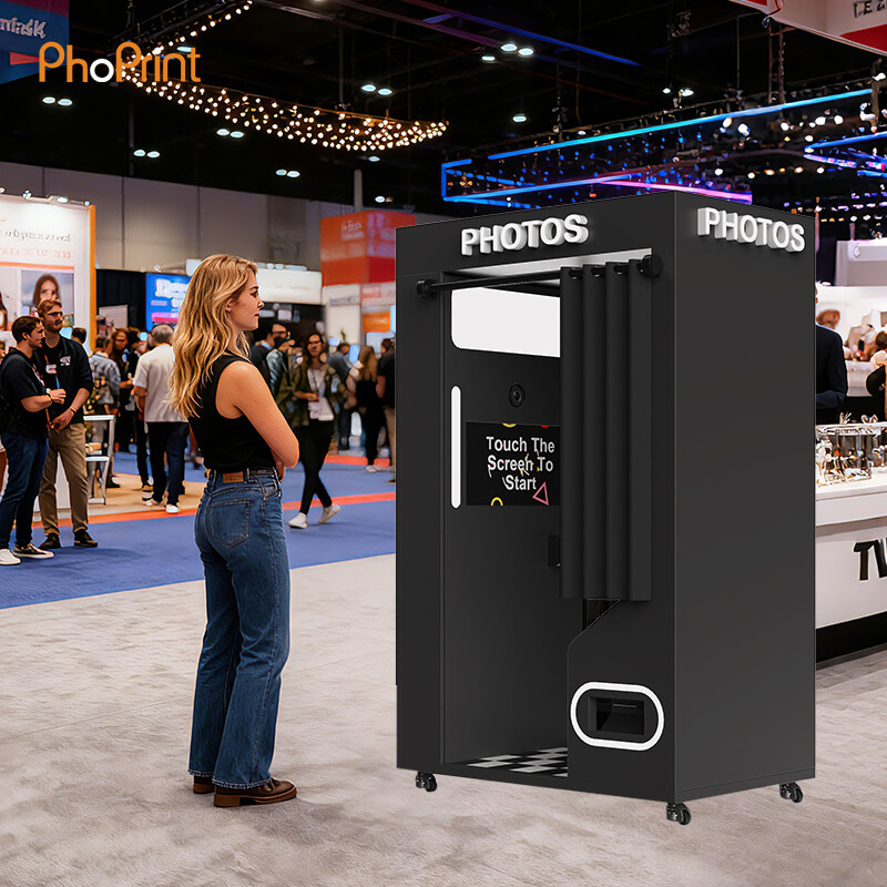 Photo Booth with Seamless Nayax Payment Experience A customer using a card on a Nayax terminal at a booth